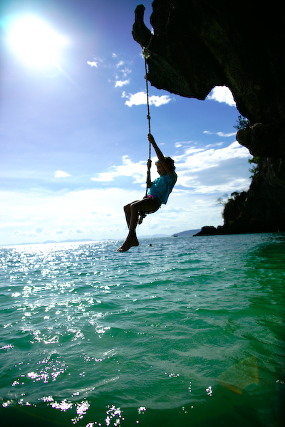 Pascaline swinging on Pranang Beach Thailand