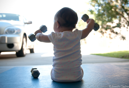 capturing baby exercising with daddy by Jennifer Tacbas