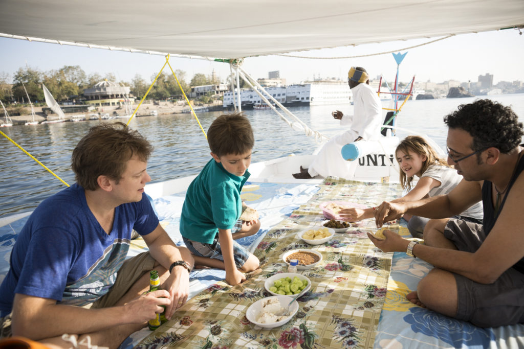 This is my photo essay of sailing Egypt's Nile River with our kids on a traditional Felucca.  We went beyond the pyramids for the most unexpected experience. 