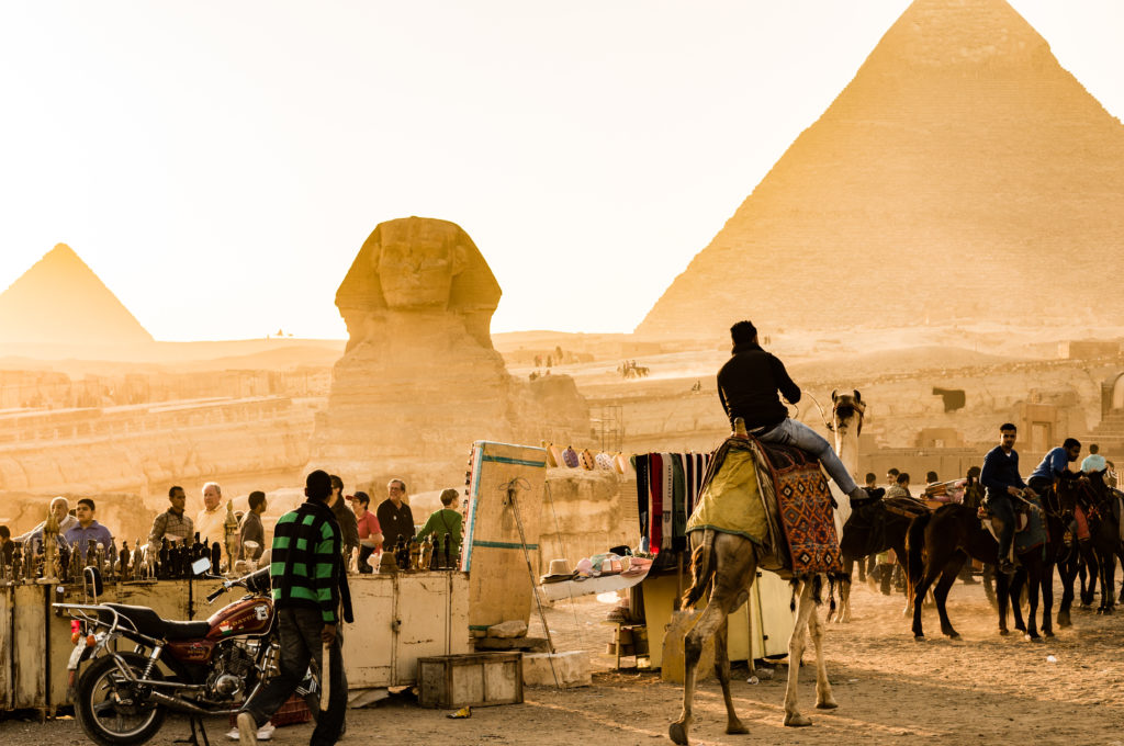 Exploring the pyramids as a family is one of the most epic adventures you can take.  Learn our best tips on when to go, where to take photos, and how to explore the inside of the pyramid. 