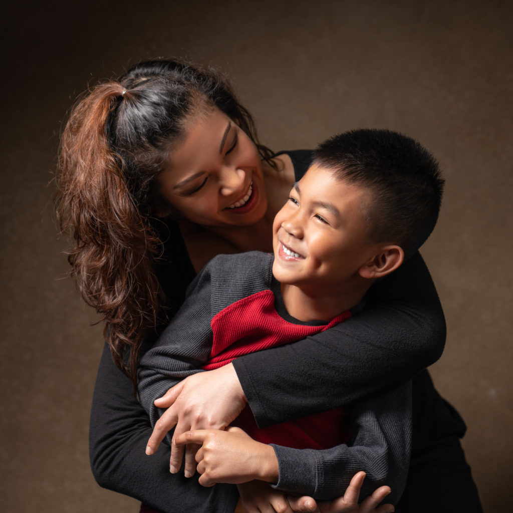 The psychology of printing photos for your family. Me Ra Koh Portraits in Frisco, Texas