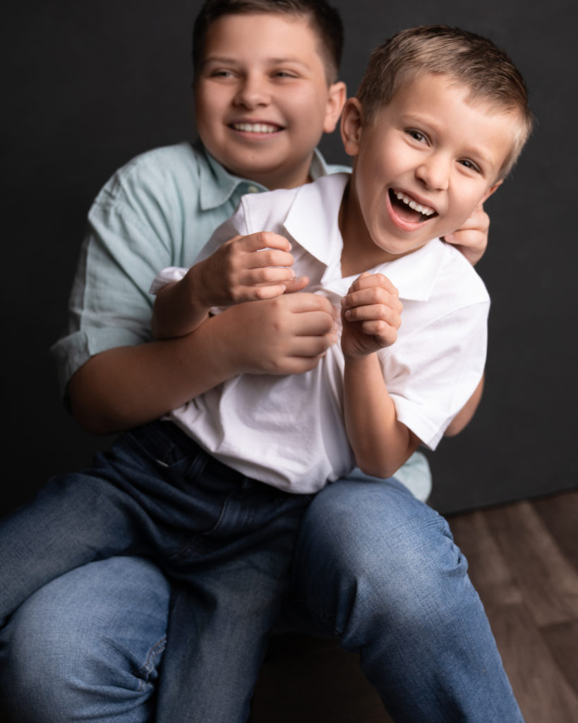 Autism and Smiling at the Camera. How photographers can help families have a wonderful experience with their family portraits by Me Ra Koh. Dallas Frisco Family Photographer and Sony Artisan.