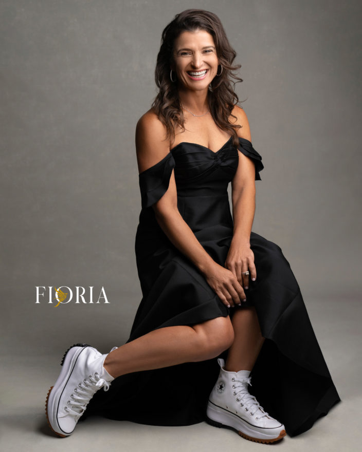 black formal dress and white sneakers portrait