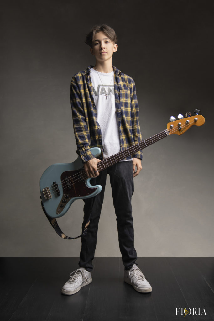 When Your Youngest Leaves Home, by Me Ra Koh, Sony Artisan and Disney Photo Mom. Senior Portrait of bass player, guitar, musician
